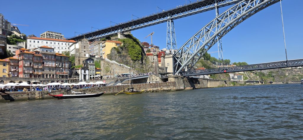 Dom Luís I Bridge over the Douro River in Porto, viewed from a sailing boat tour