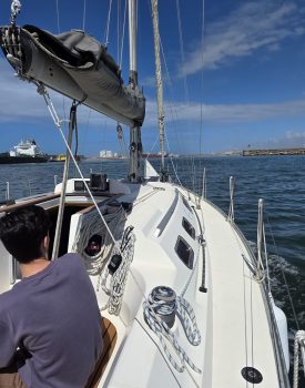 Sailing from the Douro River towards the Atlantic Ocean in Porto